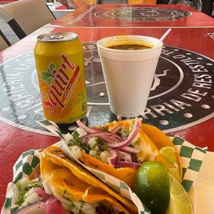 Tacos soda and birria broth