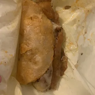 What I actually got! Where's the cheese shell?!!!!! It's so soggy I couldn't even pick it up to eat it!!