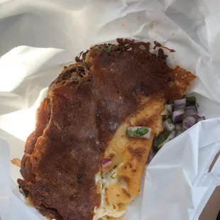 Nasty Quesa taco and they got my order wrong I wanted a vampiro better yet burned sad taco!!