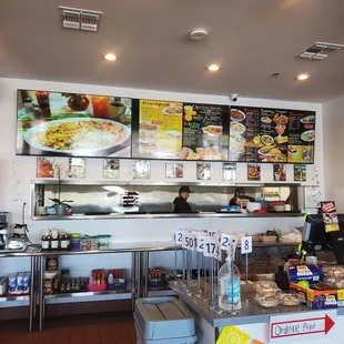 a woman standing in a restaurant