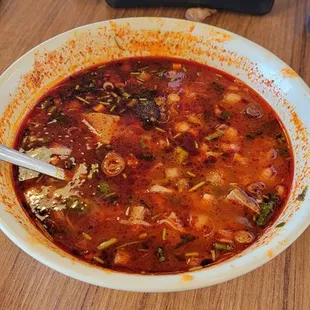 This is supposed to be menudo, but it&apos;s so dark there&apos;s no meat inside, just tasted nasty ..filibertos menudo is way better than this,