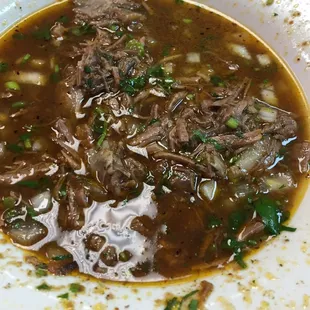a bowl of beef and mushroom soup