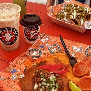 Sampler plate, mazapán horchata, birria nachos, and cucumber water