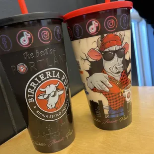 two coffee cups on a table