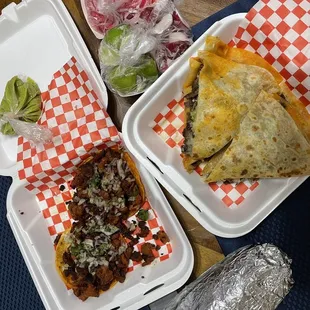 The spread: carne asada burrito, al pastor tacos, and carne asada quesadilla (only $26)