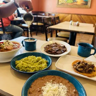 a table full of mexican food