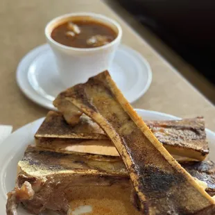 Tuetanos: bone marrow served with a cup of stew plus tortillas