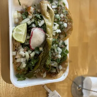 Tacos de carnitas y cueritos