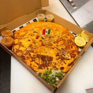 Pizza made with your choice of meat. (Picture pizza was made with our house barbacoa)