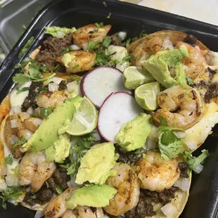 SurfNTurf Tacos  
Choice of meat Azada or Birria