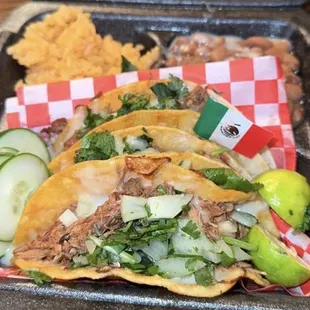 Taco plate, delicious tacos and rice n beans.