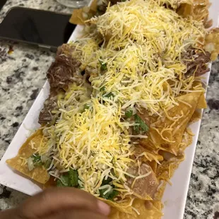 a plate of nachos