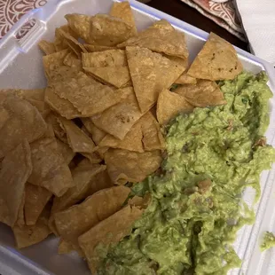 Guac and chips .... Hands one of the best guac