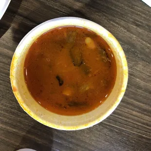 Spicy soup that comes with the dosas