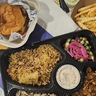 Biryani box,  burger, and  fries.