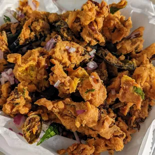 Inedible rock-hard pakora - all batter, no veggies and so hard you can't chew them