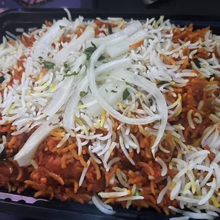 Boneless Chicken Biryani $14.99.  Very big portion can feed two people.