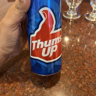 You get Thumps Up The Indian Soda!!! Felt good to 'taste the thunder' after years