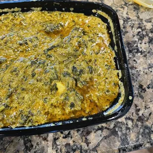 a casserole dish on a granite countertop