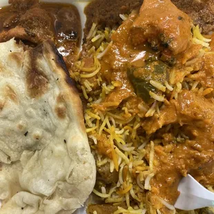 Chicken Curry with vegetable biryani.