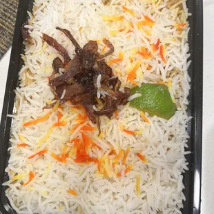 a plate of biryani rice