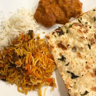 a plate of food with rice and vegetables