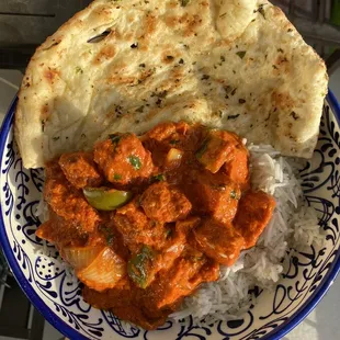 The portion sizes are HUGE! This was ~80% of the chicken tikka masala portion, all of the rice and 1/2 of the naan that came with my order.
