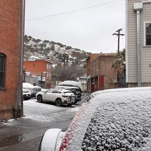 One of the lower side streets in Bisbee with a public parking lot.