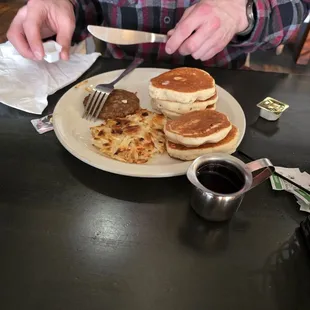 Silver dollar pancakes, hash browns and sausage patty