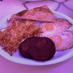 Eggs, hashbrowns, sausage patties, &amp; toast.