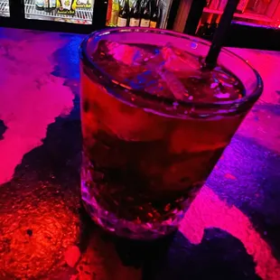 a drink on a bar counter
