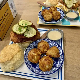 Mama's Boy biscuit and Fire in your belly biscuit with sides of loaded tots