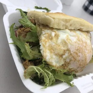 Free range chick (lightly breaded chicken fingers), zucchini, radishes, salad greens, fried egg