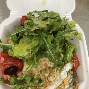 Market bowl.  Potatoes, fried egg, roasted tomatoes, arugula, pesto.