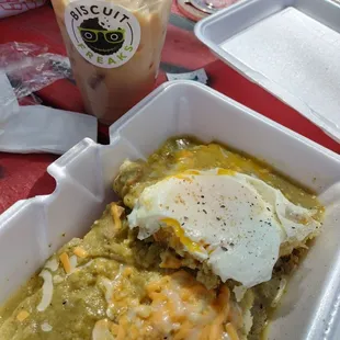 Green Chile served over a huge biscuit,  hash browns underneath, topped w an egg &amp; cheese.  Bring your own fork!