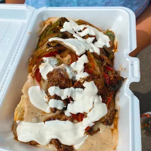 a sandwich in a styrofoam container
