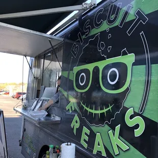 a food truck with a skull painted on the side