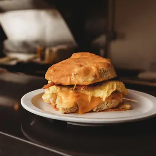 a breakfast sandwich on a plate