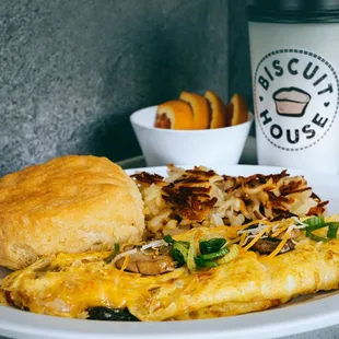 an omelet, biscuits, and coffee