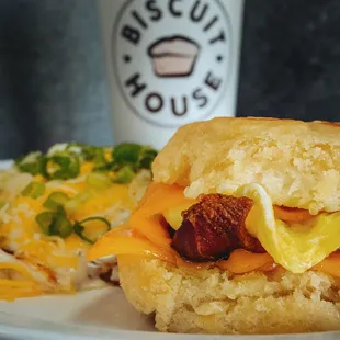 a breakfast sandwich and a cup of coffee