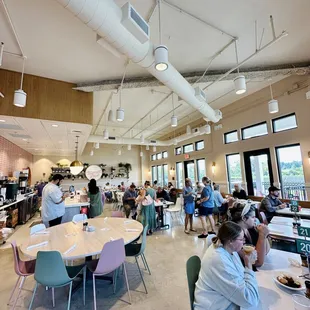 a busy restaurant with people eating