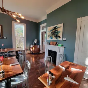 a dining room with a fireplace