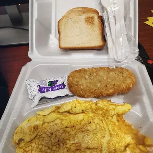 Cheese omelette with hashbrown and toast