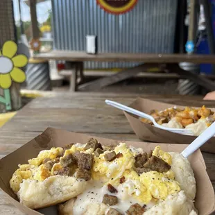 a breakfast of eggs and sausage