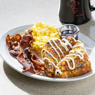 bacon, eggs, and hash browns on a plate