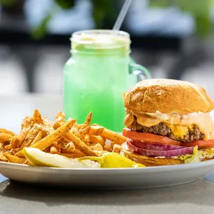 a burger and french fries on a plate