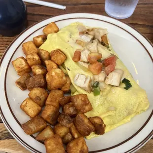 Omelette with veggies and chicken with house fries