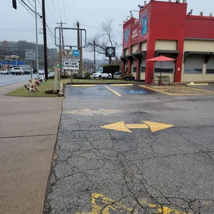 The parking lot of the dog place where the food truck sits.