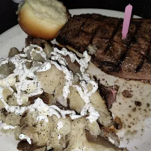 16oz. Kansas City Strip with salad bar, baked potato and roll