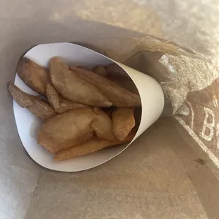 french fries in a paper bag